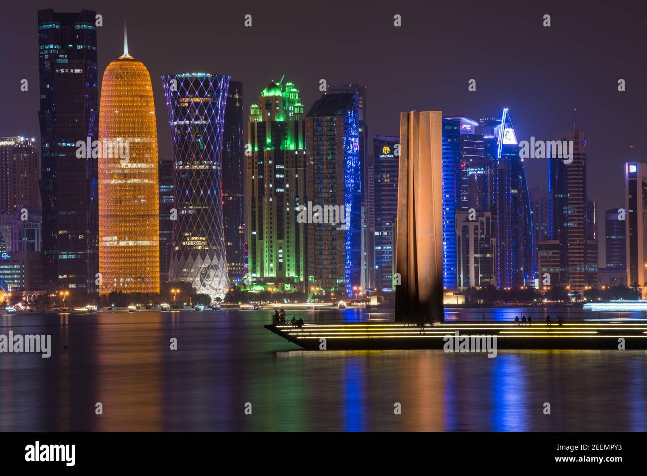Doha skyline reflection at sea at night,Qatar Stock Photo - Alamy