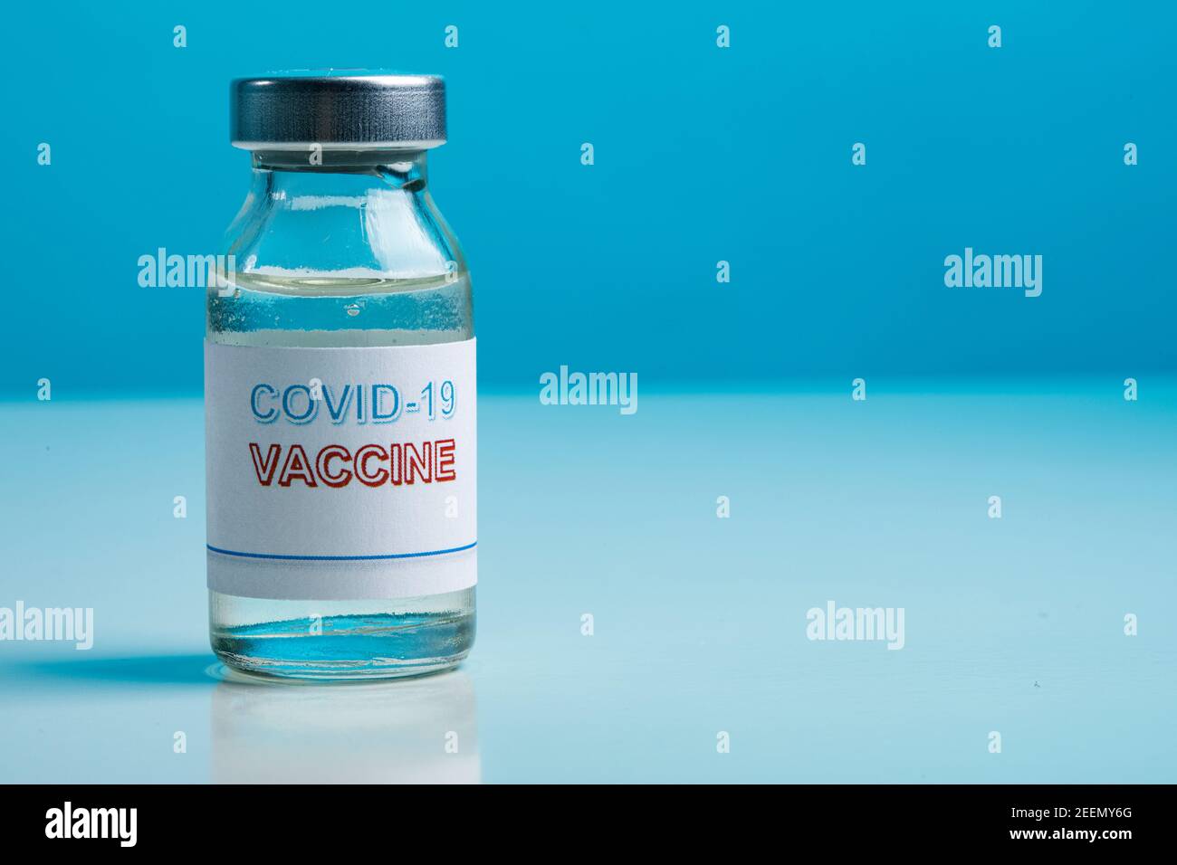 Coronavirus vaccine bottle isolated on light blue background Stock ...