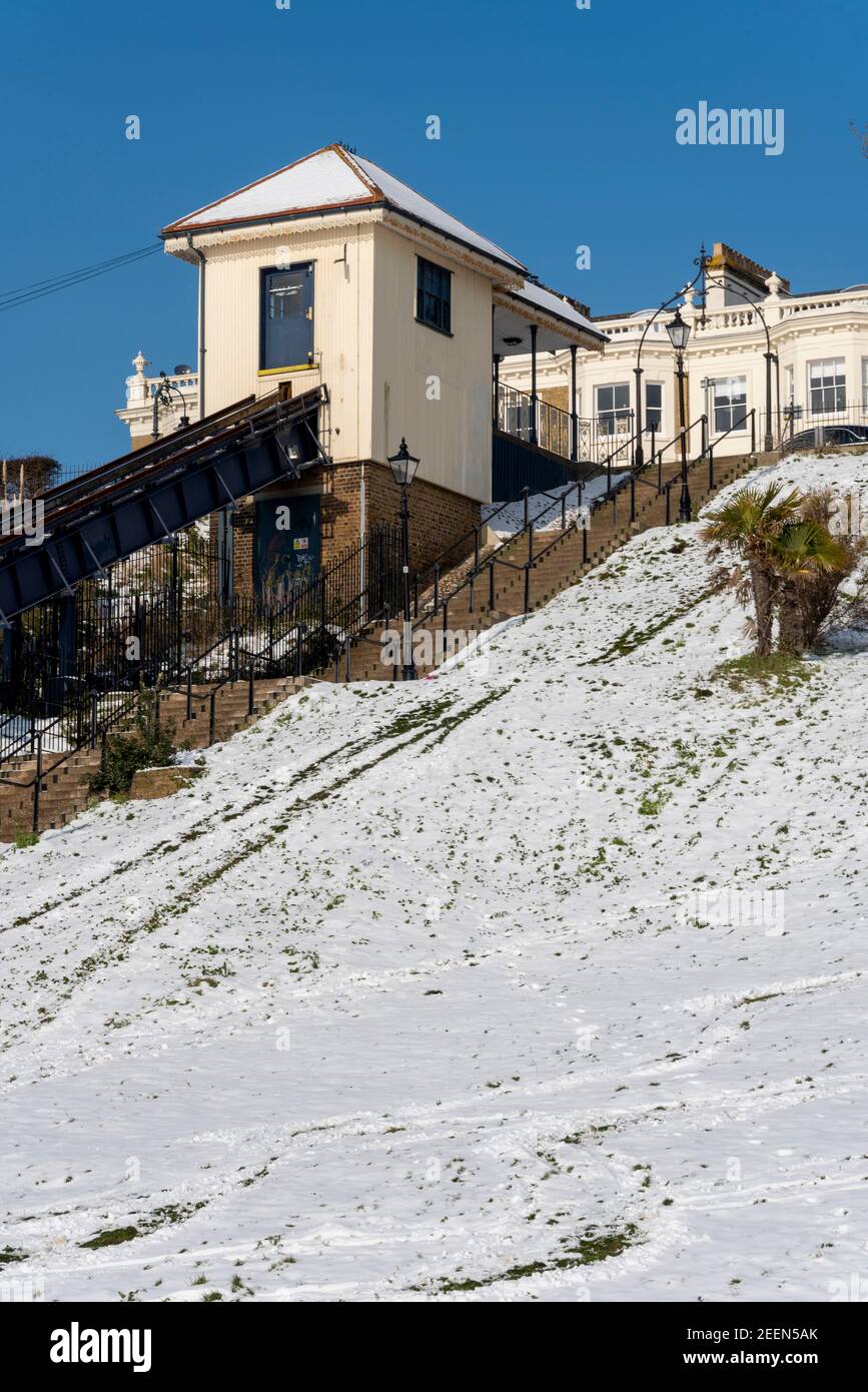Southend Cliff Lift, Western Esplanade, Southend on Sea, Essex, UK seafront historic attraction with snow on Cliff Gardens from Storm Darcy Stock Photo