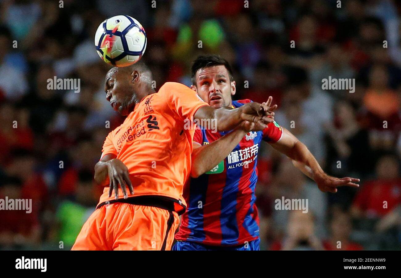 Soccer Football - Liverpool vs Crystal Palace - Premier League Asia Trophy - Hong Kong, China - July 19, 2017   Liverpool's Daniel Sturridge in action with Crystal Palace's Scott Dann   REUTERS/Bobby Yip Stock Photo