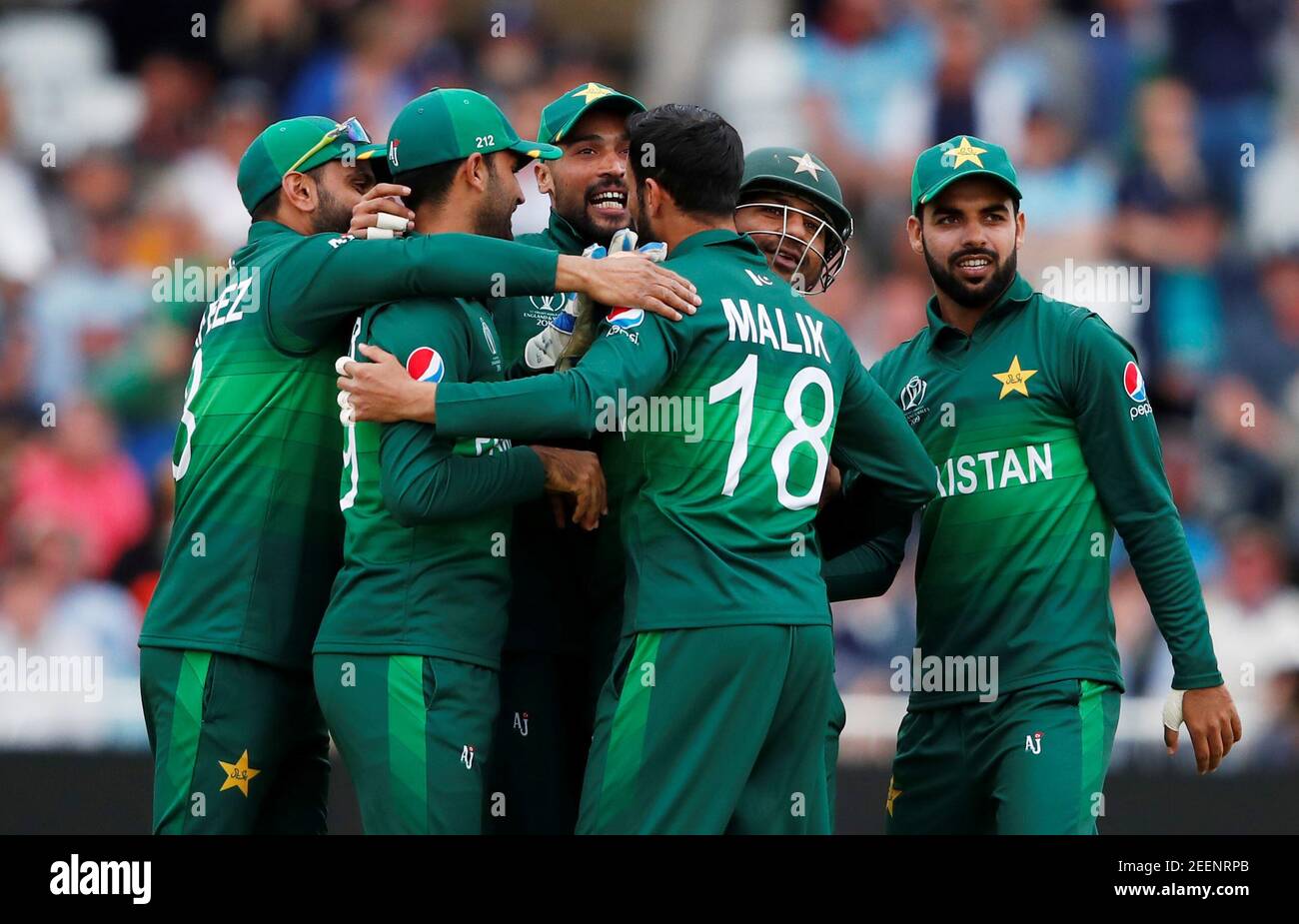 Cricket - ICC Cricket World Cup - England v Pakistan - Trent Bridge,  Nottingham, Britain - June 3, 2019 Pakistan's Shoaib Malik and Sarfaraz  Ahmed celebrates the wicket of England's Ben Stokes