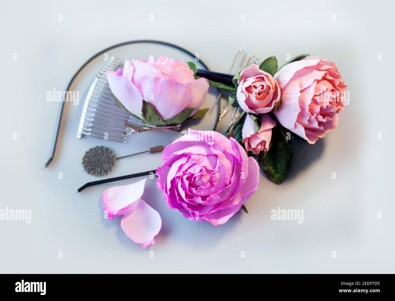Step-by-step masterclass workshop, handicraft guide, top view on making hair jewelry with Artificial Rose Flowers from foam, EVA spongy material, foam Stock Photo