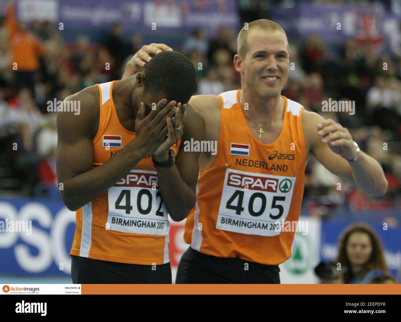 Athletics - European Indoor Athletics Championships - National Indoor Arena  - 2/3/07 Gregory Sedoc (L) of Holland is overcome with emotion after he won  the gold medal in the 60m hurdles. He
