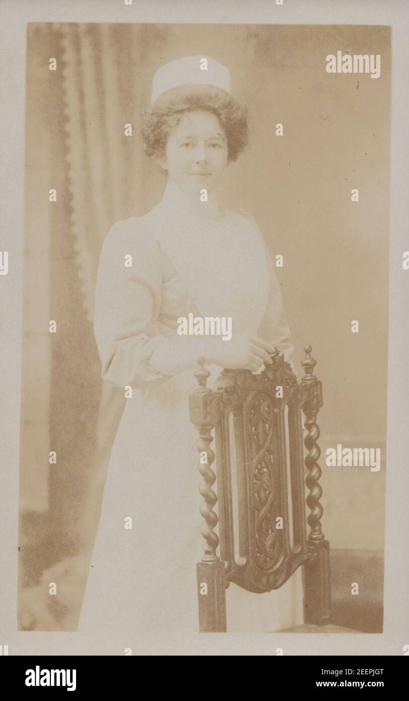 Vintage Early 20th Century London Photographic Postcard Showing a Female Nurse in Her Uniform. Stock Photo