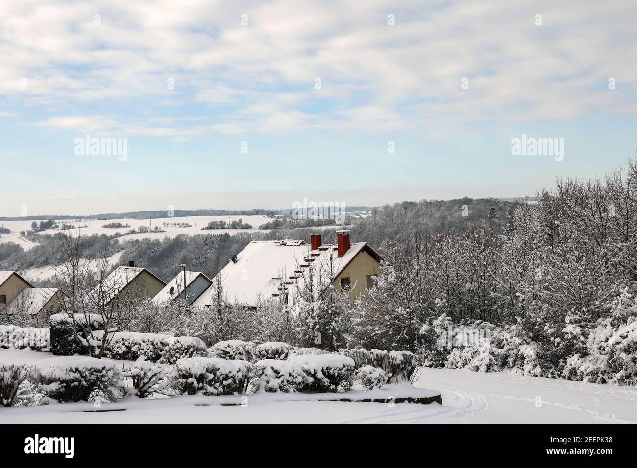 Winter landscape. The roofs of the houses are covered with snow Stock ...