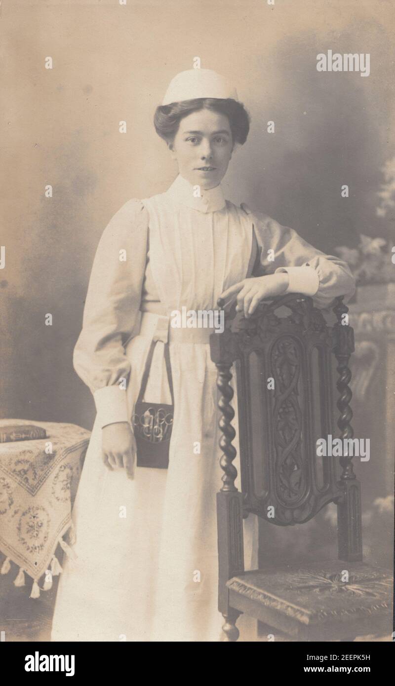 Vintage Early 20th Century London Photographic Postcard Showing a Female Nurse in Her Uniform. Stock Photo