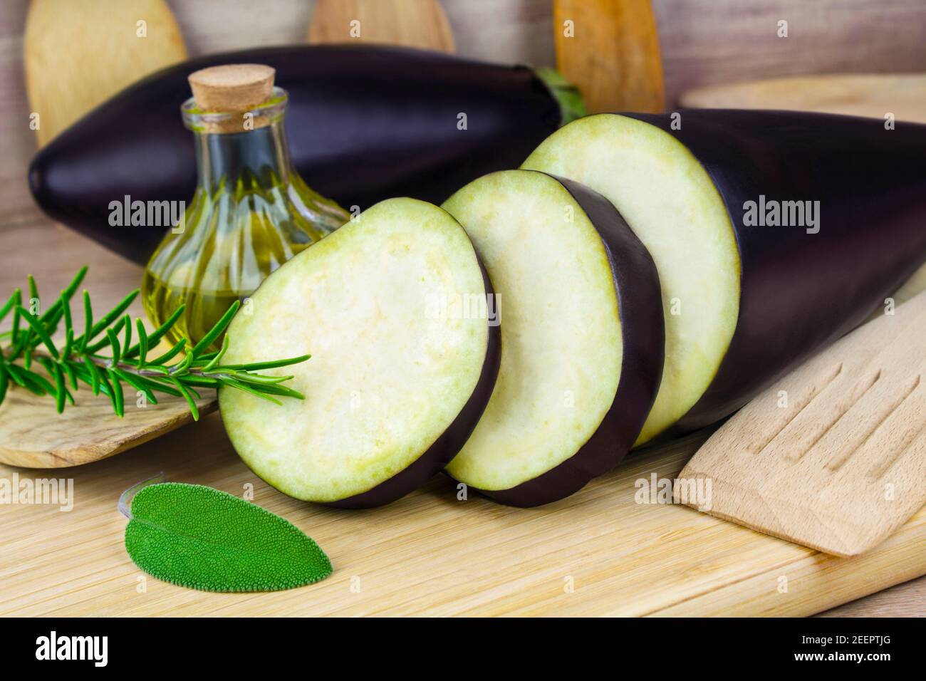 Aubergines with olive oil and herbs Stock Photo Alamy