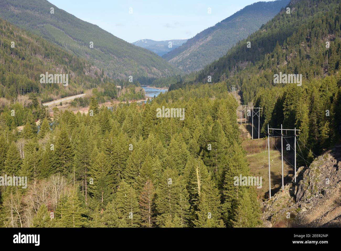 The Kootenai River Valley below the Libby Dam with high voltage ...