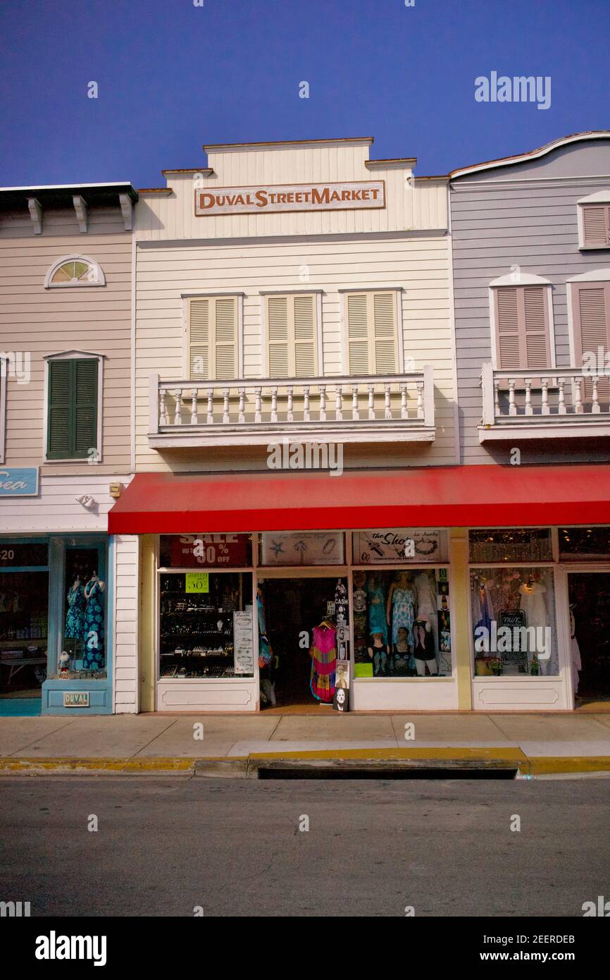 Store Fronts along Duval Street in Key West, Florida, FL USA.  Southern most point in the continental USA.  Island vacation destination. Stock Photo