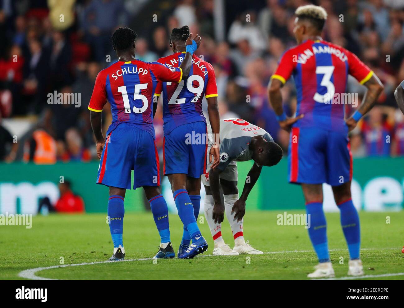 Soccer Football - Premier League - Crystal Palace v Liverpool - Selhurst Park, London, Britain - August 20, 2018  Crystal Palace's Aaron Wan-Bissaka with Jeffrey Schlupp after being shown a red card by the referee                       REUTERS/Eddie Keogh  EDITORIAL USE ONLY. No use with unauthorized audio, video, data, fixture lists, club/league logos or 'live' services. Online in-match use limited to 75 images, no video emulation. No use in betting, games or single club/league/player publications.  Please contact your account representative for further details. Stock Photo