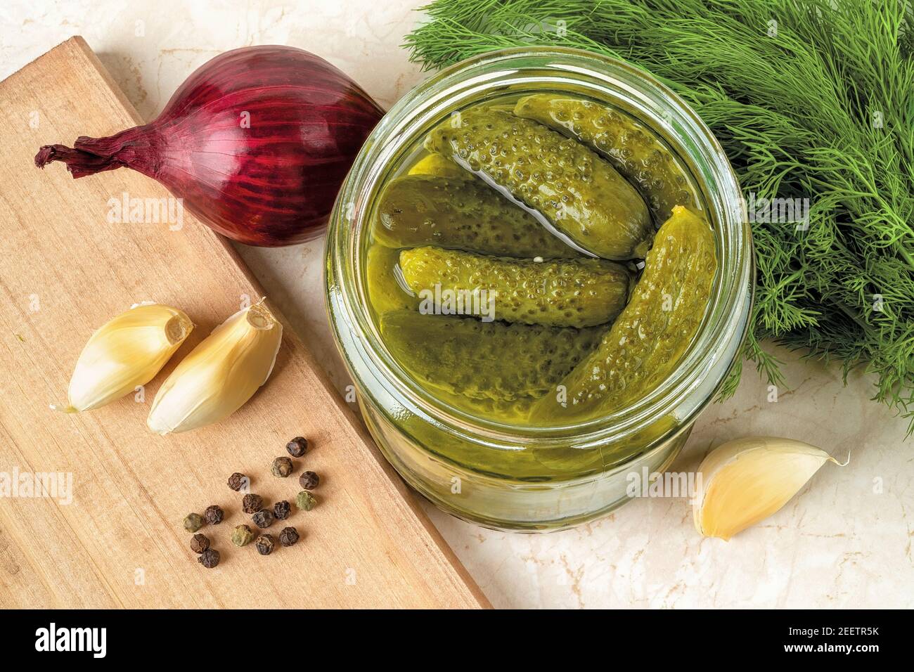 Small onion gherkin on fork hires stock photography and images Alamy