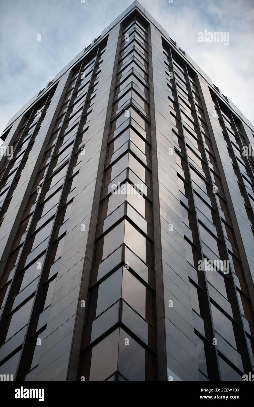 Towering grey modern office building, Birmingham, UK Stock Photo