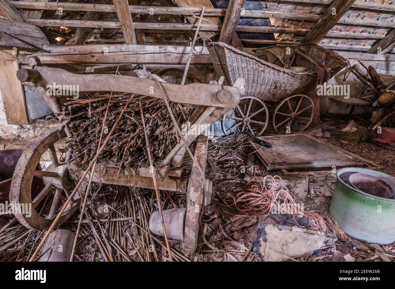 old carriages of wood and straw on a loft Stock Photo