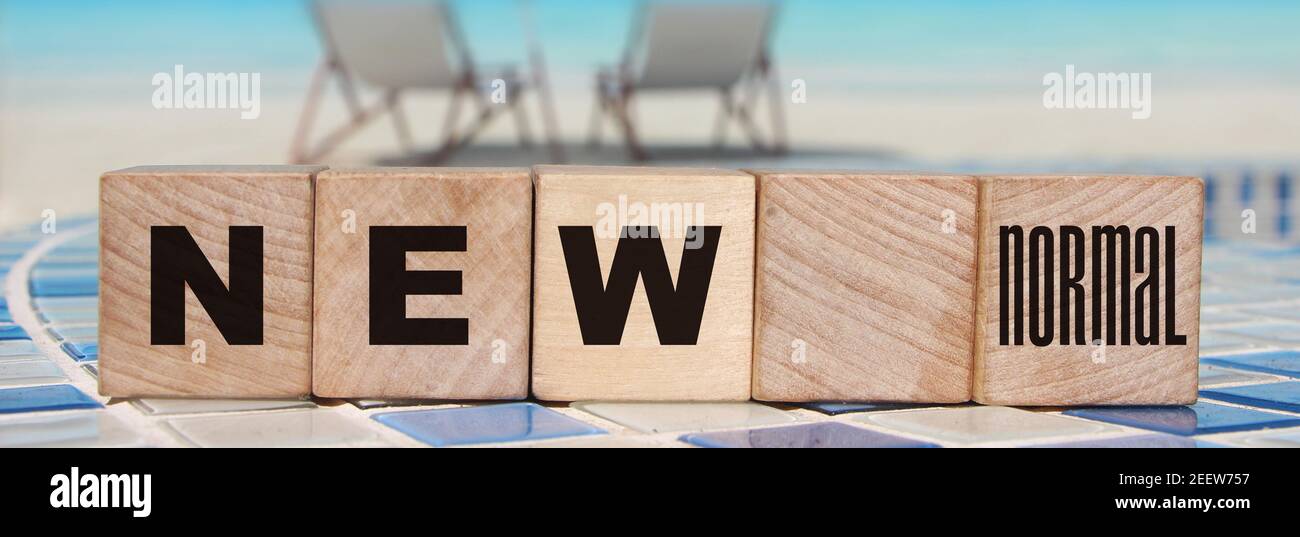 NEW NORMAL text on wooden cube. New normal life after covid-19 pandemic ...