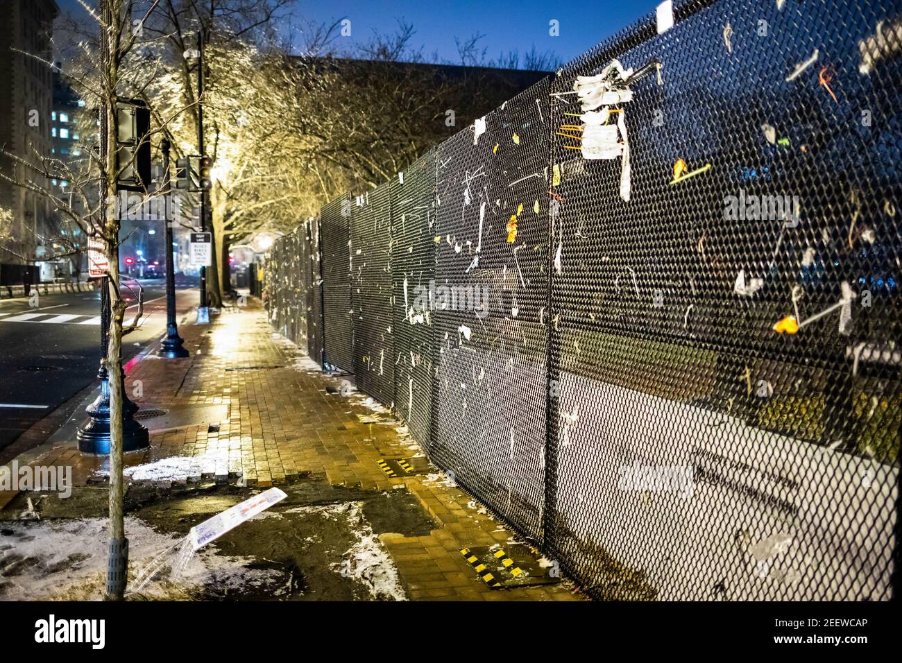 Security fence surrounds White house building after Capitol Hill riots at night Stock Photo