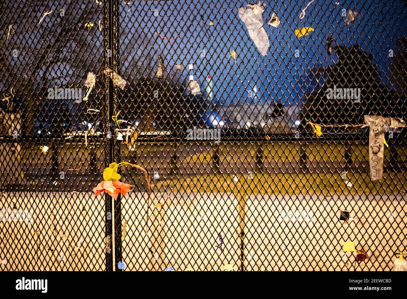 Security fence surrounds White house building after Capitol Hill riots, at night Stock Photo