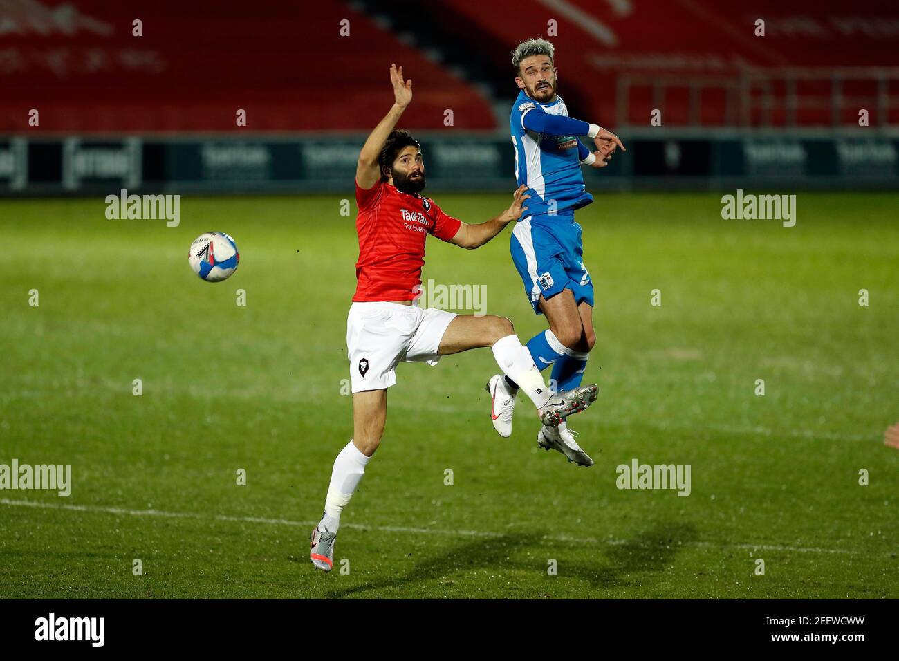 SALFORD, ENGLAND. FEB 16TH Barrows Brad Barry clashes with Salfords Richie Towell during the Sky Bet League 2 match between Salford City and Barrow at Moor Lane, Salford on Tuesday 16th February 2021. (Credit: Chris Donnelly | MI News) Credit: MI News & Sport /Alamy Live News Stock Photo