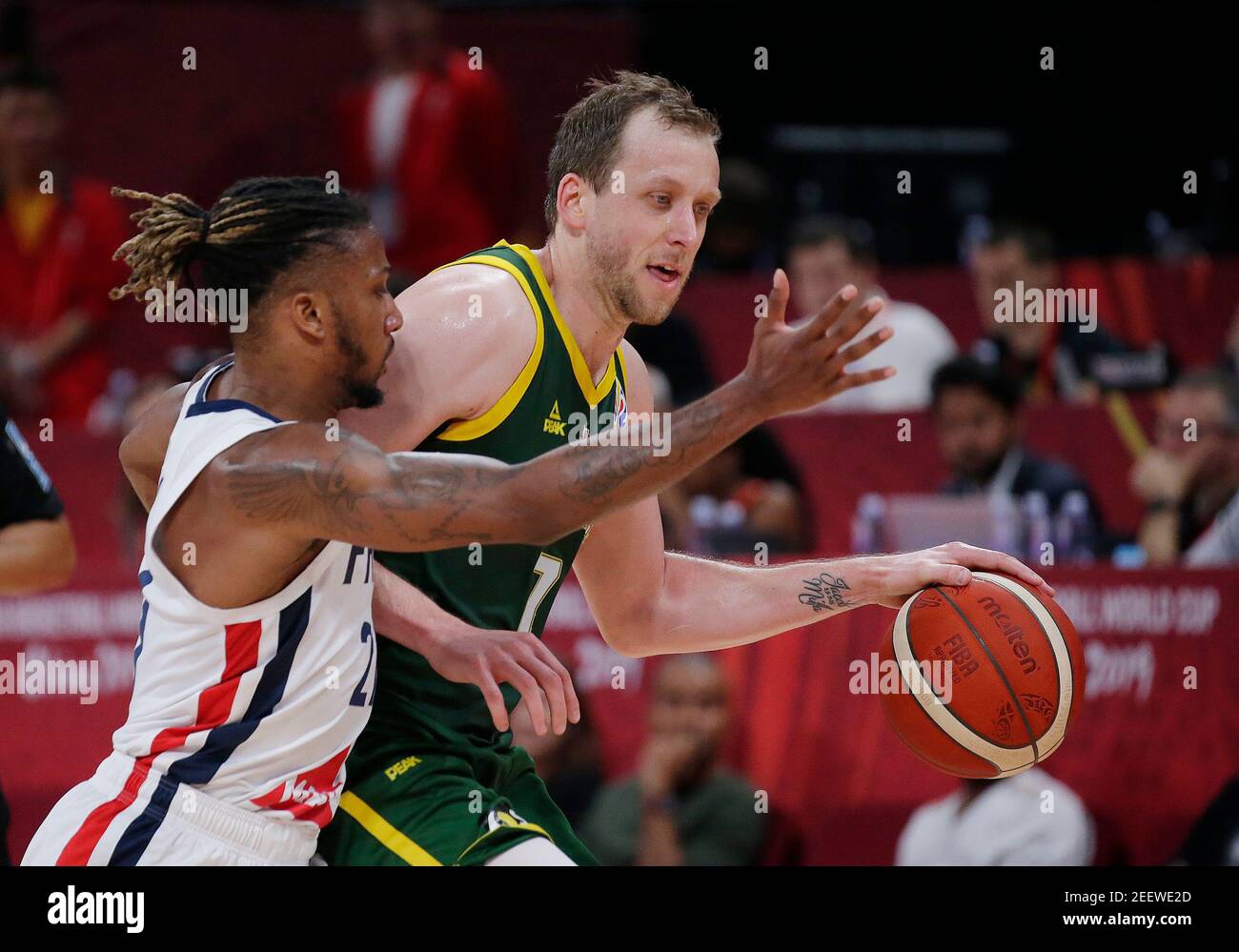 Basketball - FIBA World Cup - 3rd Place Game - France v Australia - Wukesong Sport Arena, Beijing, China - September 15, 2019  Australia's Joe Ingles in action with France's Andrew Albicy REUTERS/Jason Lee Stock Photo