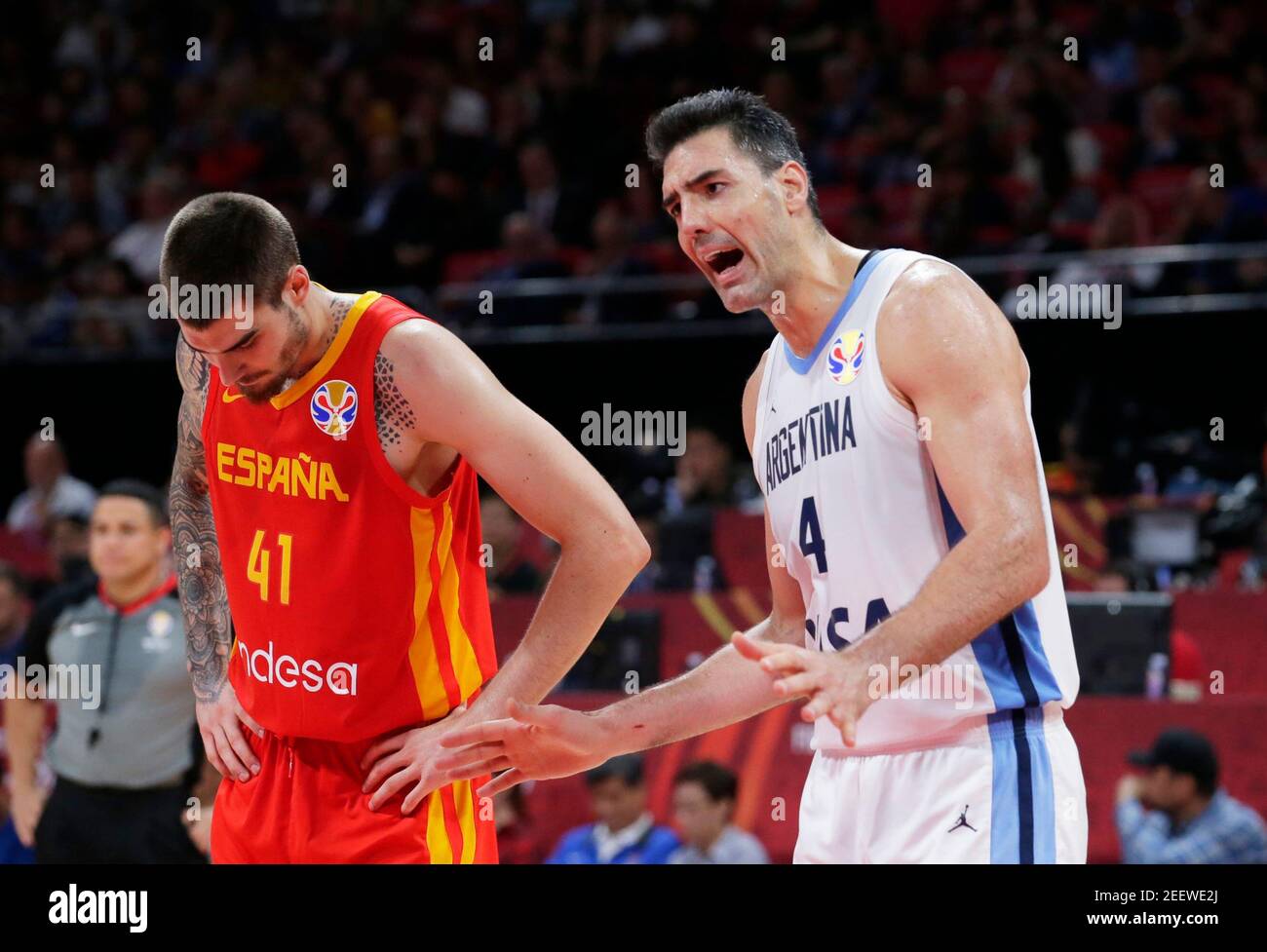 Basketball - FIBA World Cup - Final - Argentina v Spain - Wukesong Sport Arena, Beijing, China - September 15, 2019   Argentina's Luis Scola and Spain's Juancho Hernangomez react during the match REUTERS/Jason Lee Stock Photo