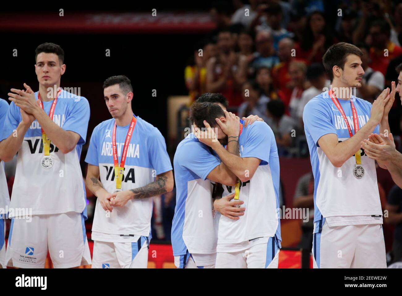 Basketball - FIBA World Cup - Final - Argentina v Spain - Wukesong Sport Arena, Beijing, China - September 15, 2019   Argentina's players look dejected during the ceremony after receiving their silver medals REUTERS/Jason Lee Stock Photo