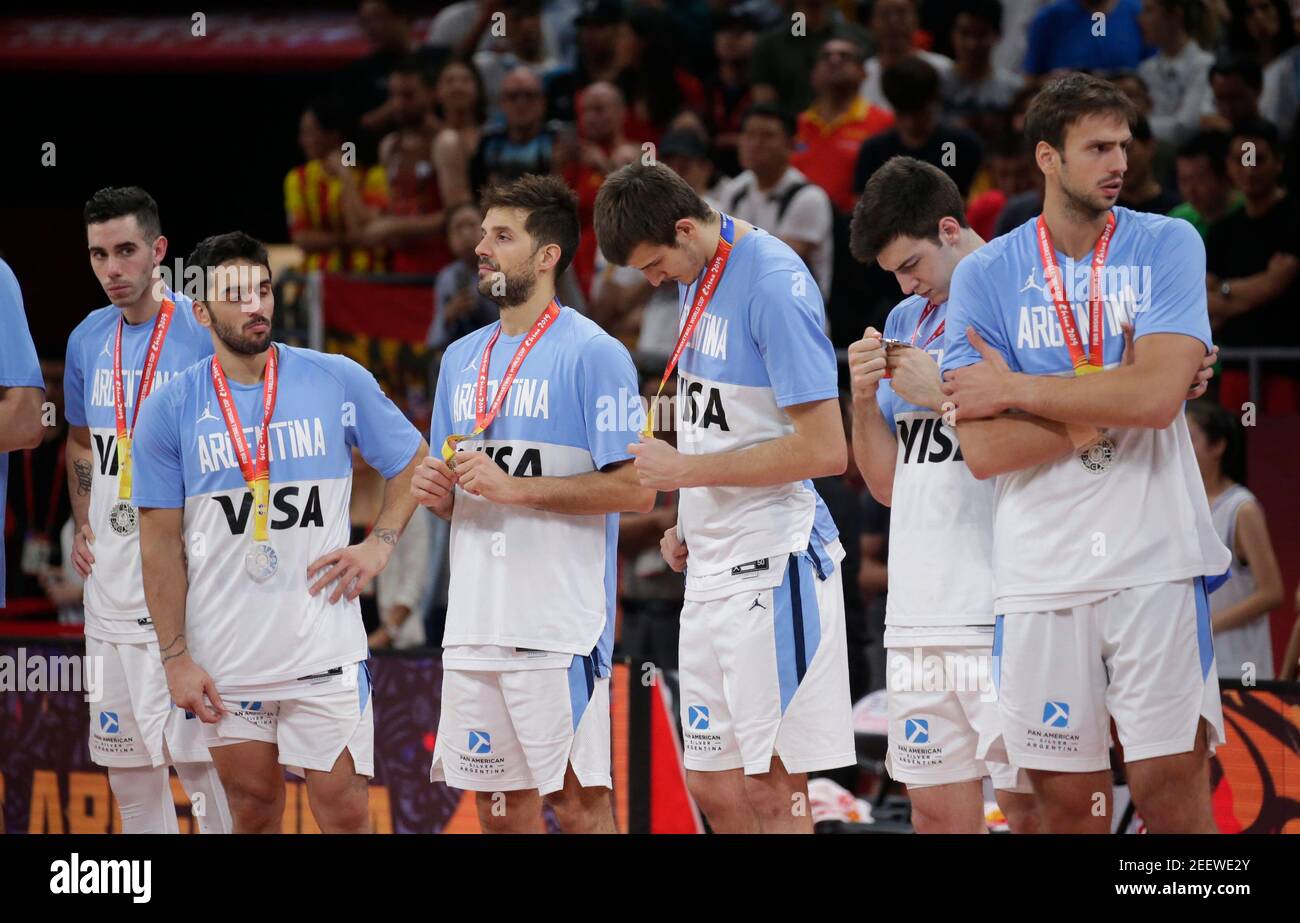 Basketball - FIBA World Cup - Final - Argentina v Spain - Wukesong Sport Arena, Beijing, China - September 15, 2019 Argentina's players look dejected during the ceremony after receiving their silver medals REUTERS/Jason Lee Stock Photo