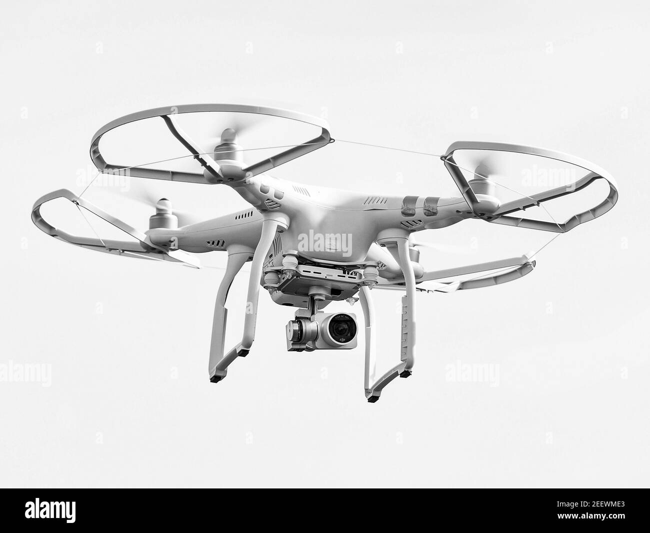 DJI phantom drone flying in the wind Stock Photo