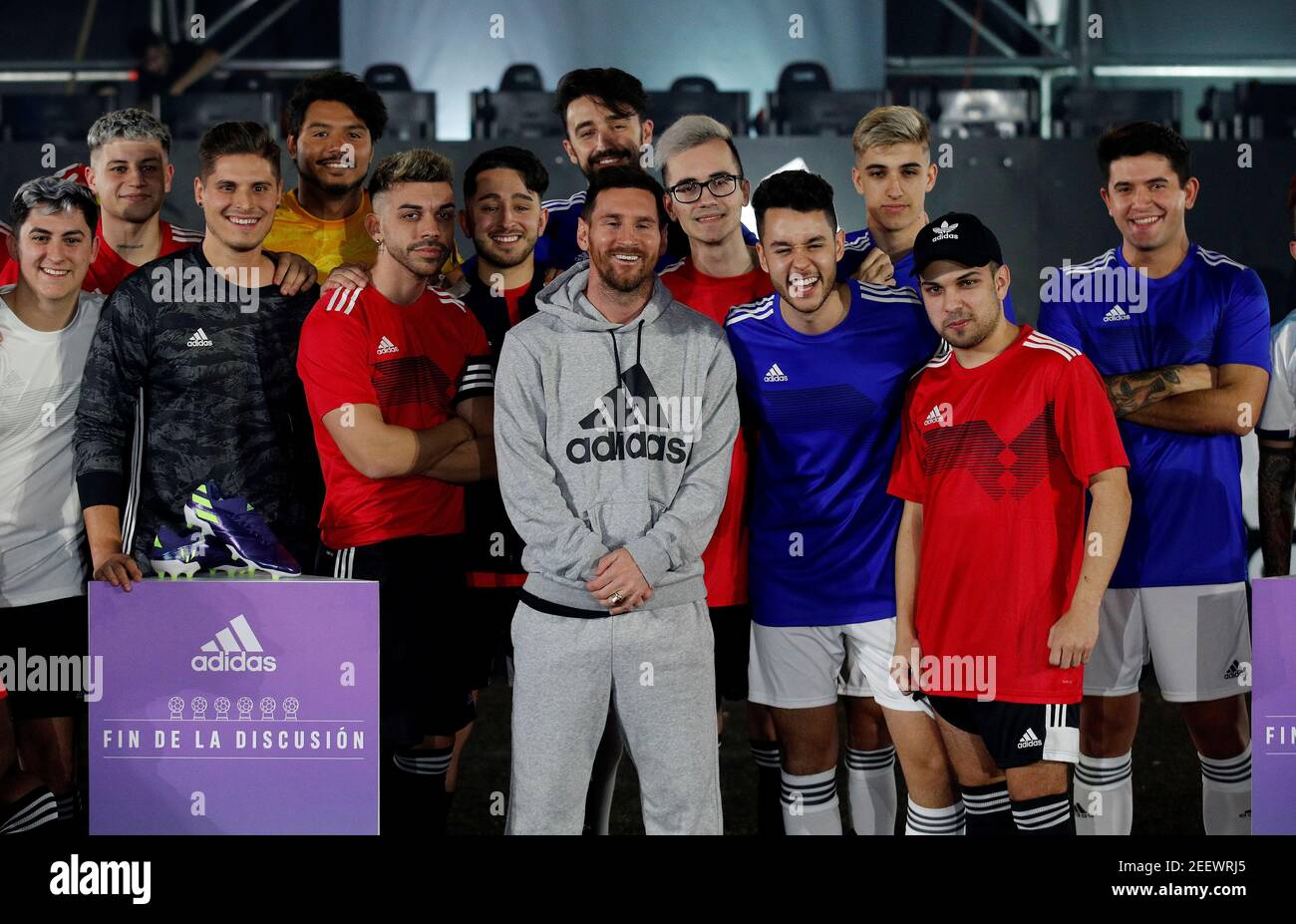 Soccer Football - FC Barcelona's Lionel Messi presents his new boots -  L'Hospitalet de Llobregat, Barcelona, Spain - December 11, 2019 Barcelona's  Lionel Messi poses for a photograph with youtubers during the