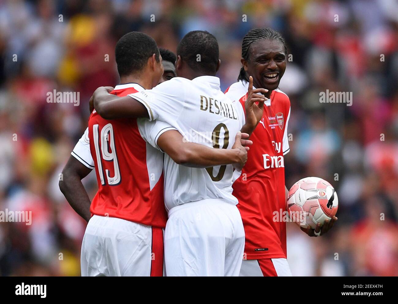 Britain Football Soccer - Arsenal Legends v AC Milan Legends - Emirates  Stadium - 3/9/16 AC Milan Legends' Marcel Desailly with Arsenal Legends'  Gilberto as Kanu collects his hat-trick ball Action Images