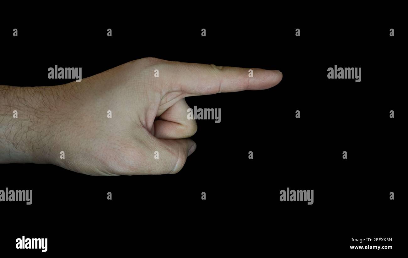 Hand pointing in the right direction. Advertising and marketing concept. Hand gesture isolated on black background. Advertisement attention concept. Stock Photo