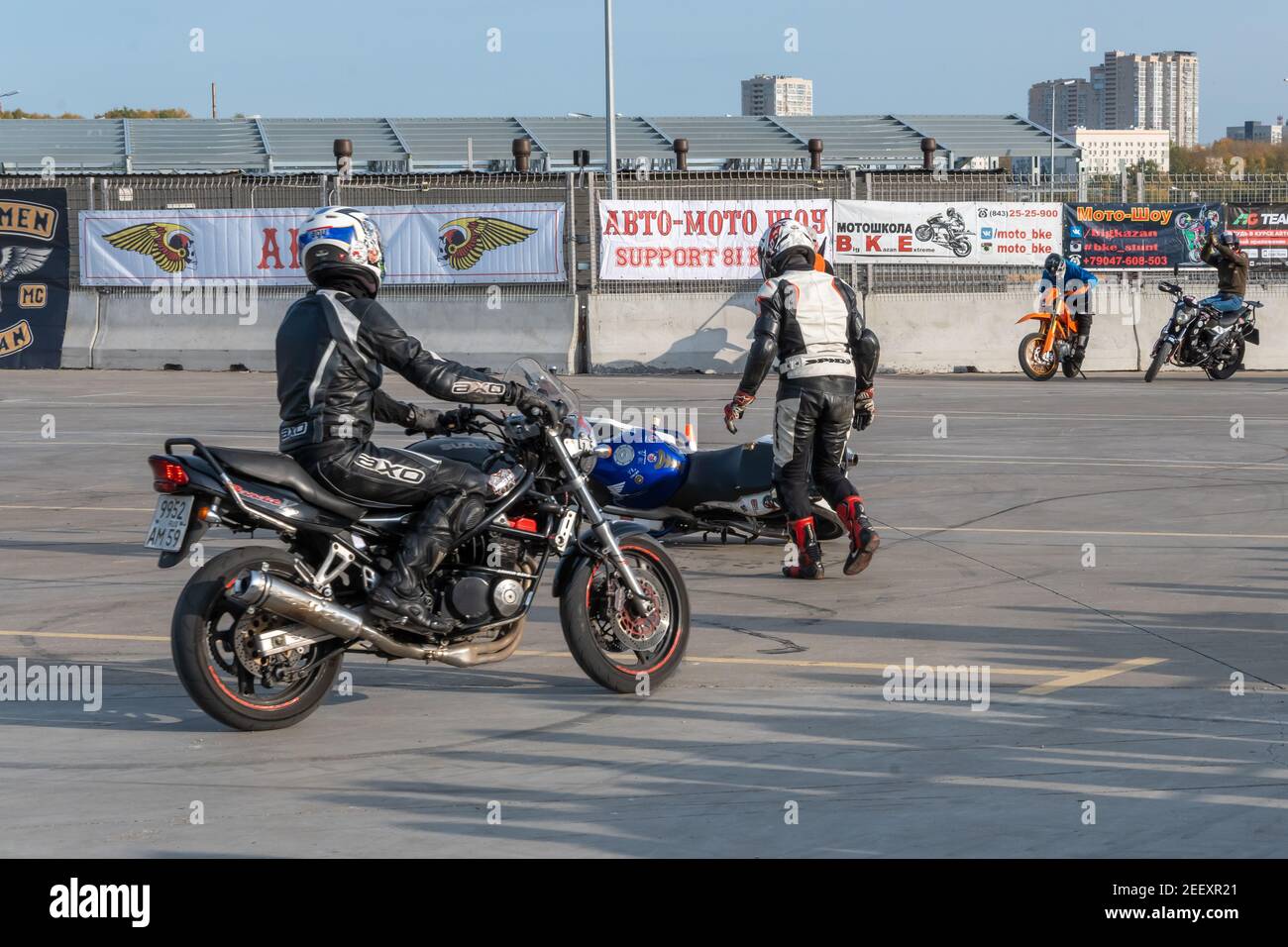 Kazan, Russia-September 26, 2020: Motorcycle gymkhana, pair racing, biker fall from Honda motorcycle on race track Stock Photo