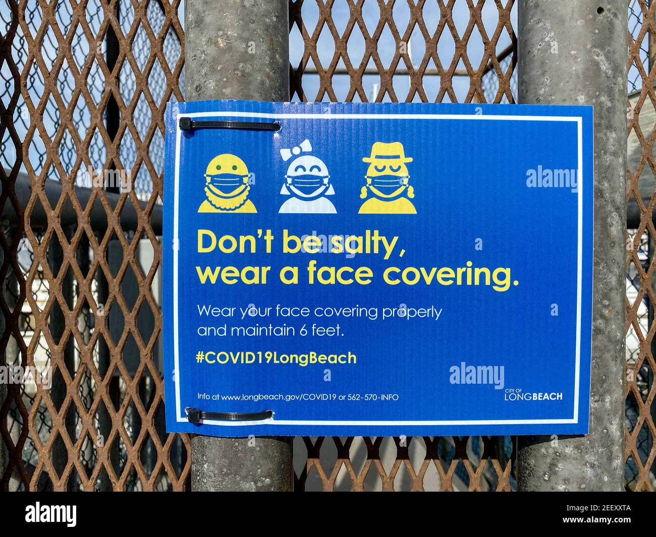 Face covering required sign in Long Beach California Stock Photo Alamy