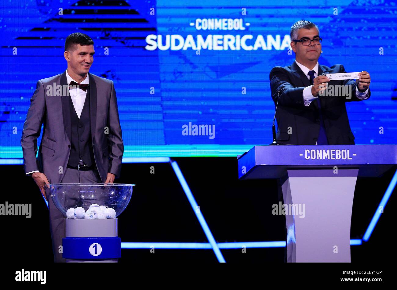 Soccer Football - Copa Sudamericana 2020 Draw - CONMEBOL Headquarters - Luque, Paraguay - December 17, 2019   Independiente del Valle's Jorge Pinos and Conmebol Director of Club Competitions Frederico Nantes draw Atletico Mineiro  REUTERS/Jorge Adorno Stock Photo