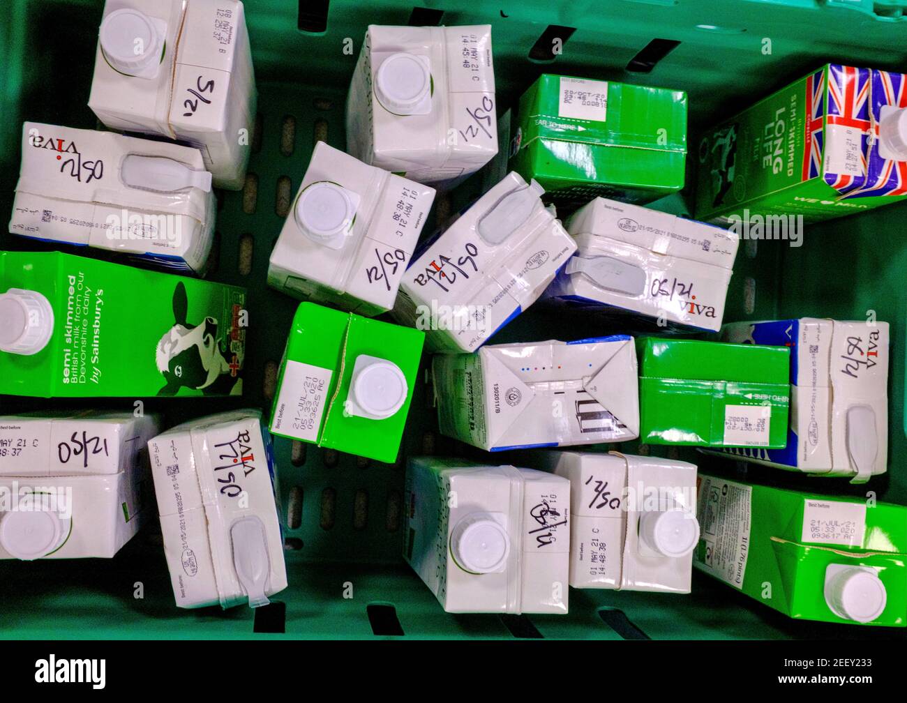 A crate of UHT cartons of milk donated to a Trussell Trust foodbank
