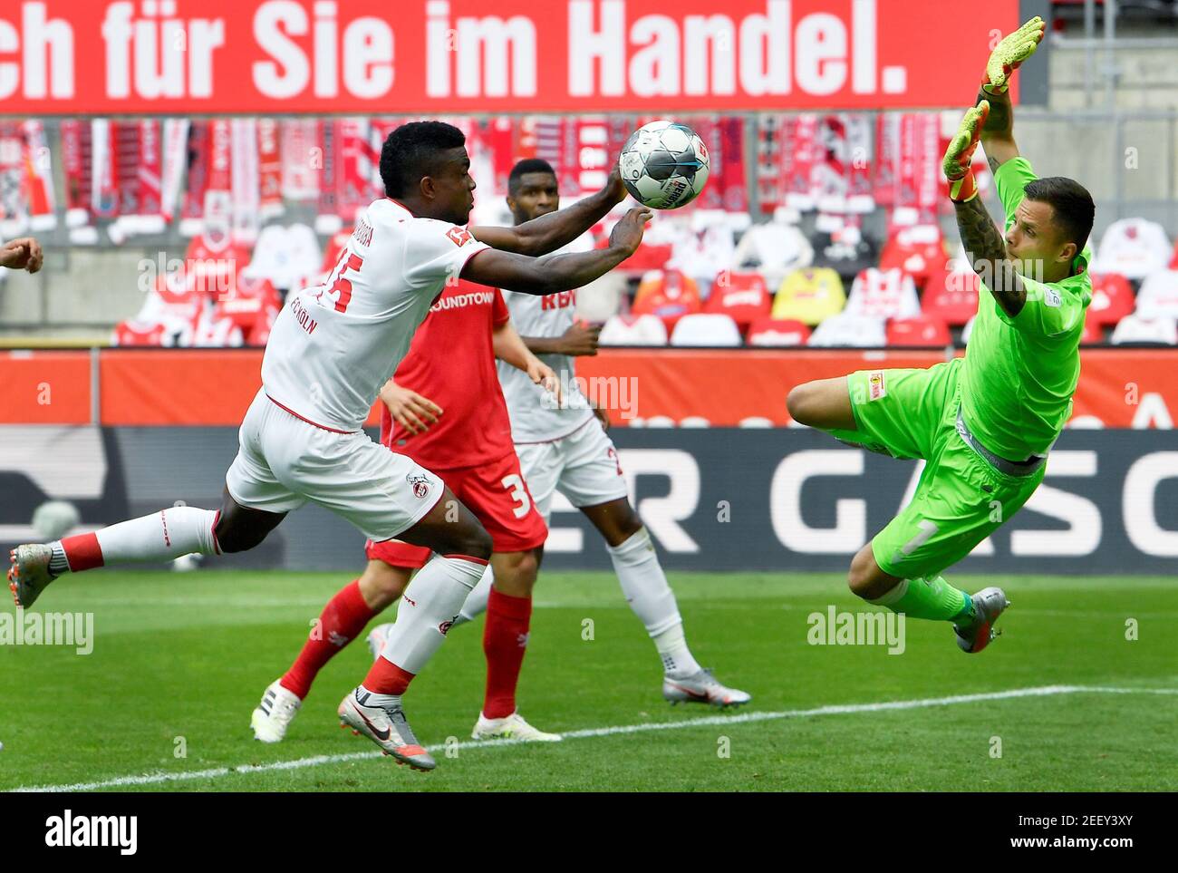 Soccer Football - Bundesliga - FC Cologne v 1. FC Union Berlin - RheinEnergieStadion, Cologne, Germany - June 13, 2020 Cologne's Jhon Cordoba in action with Union's Rafal Gikiewicz, as play resumes behind closed doors following the outbreak of the coronavirus disease (COVID-19) Martin Meissner/Pool via REUTERS  DFL regulations prohibit any use of photographs as image sequences and/or quasi-video Stock Photo