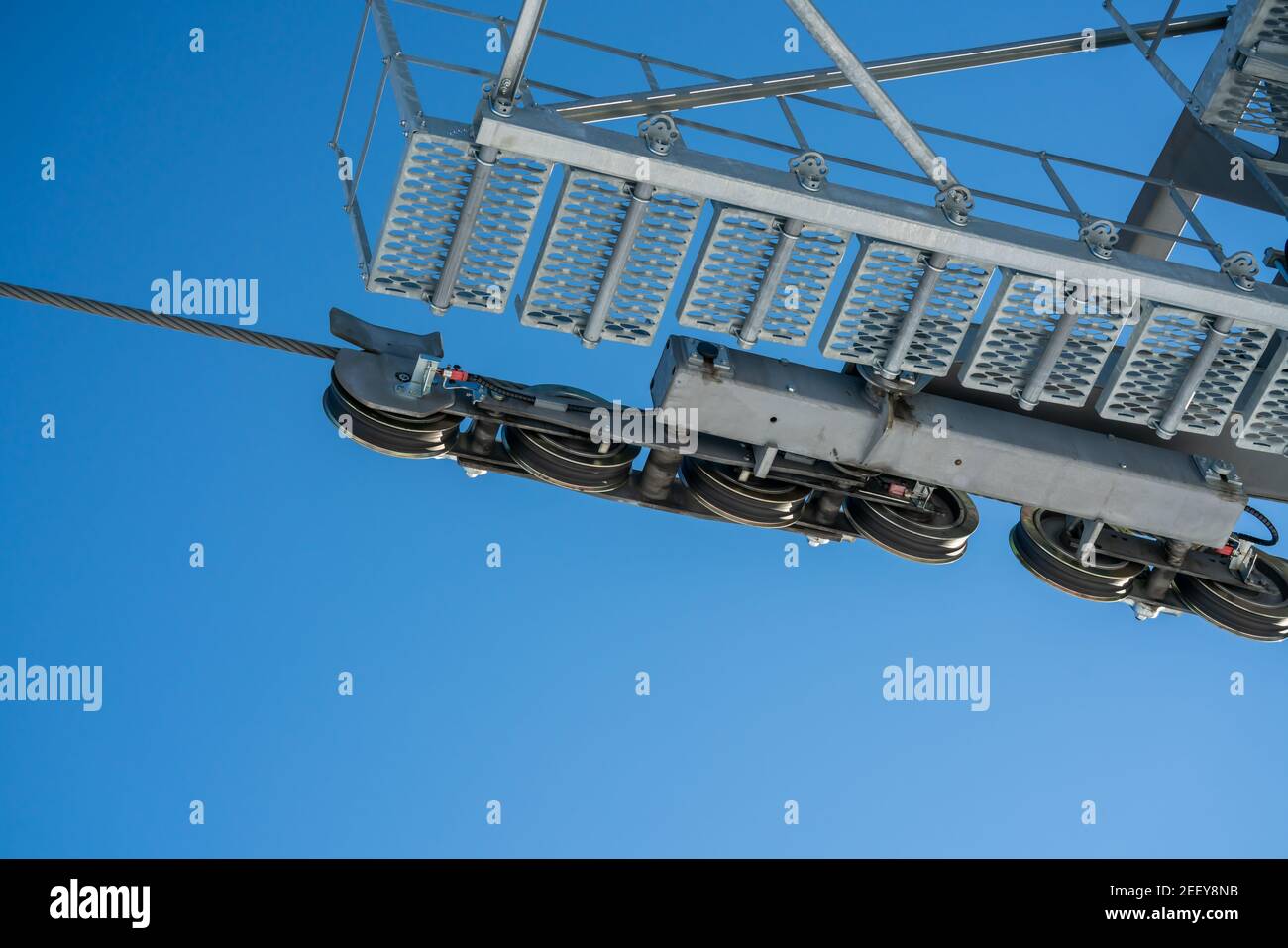 Close up of gears and pulleys of a ski lift at a winter sports resort ...