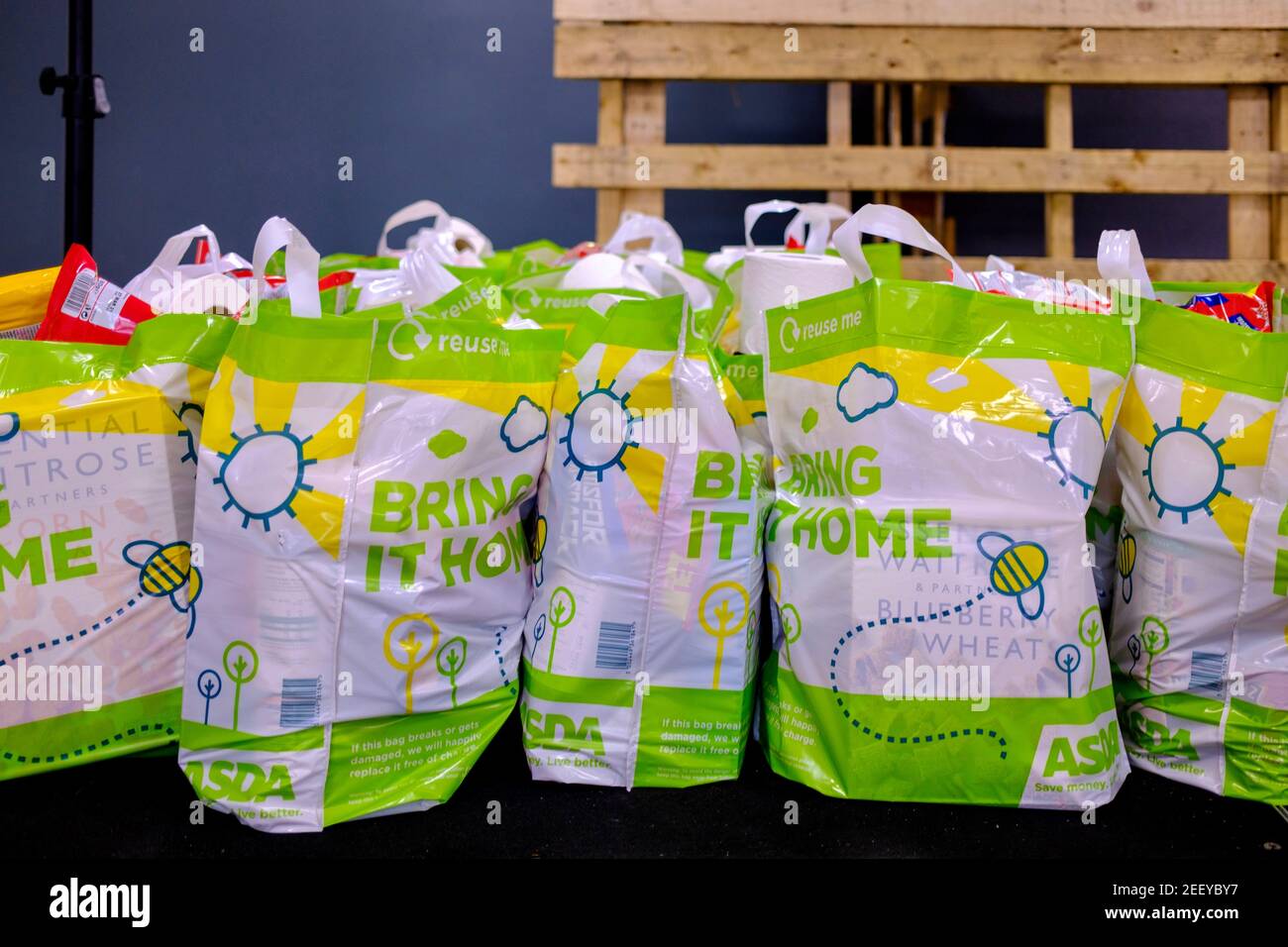 Crates of shopping bags full of food donations at a Trussell Trust