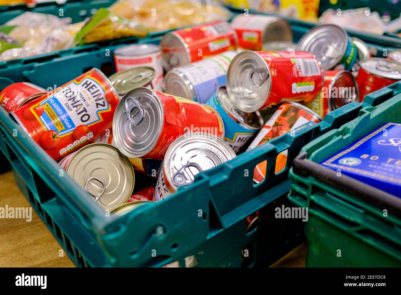 Tinned food, including Heinz Tomato soup, donated to a Trussell Trust Foodbank. Food donations for people experiencing food poverty. London, UK. Stock Photo