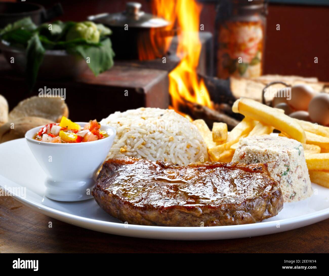 Grilled meat with trimmings Stock Photo Alamy