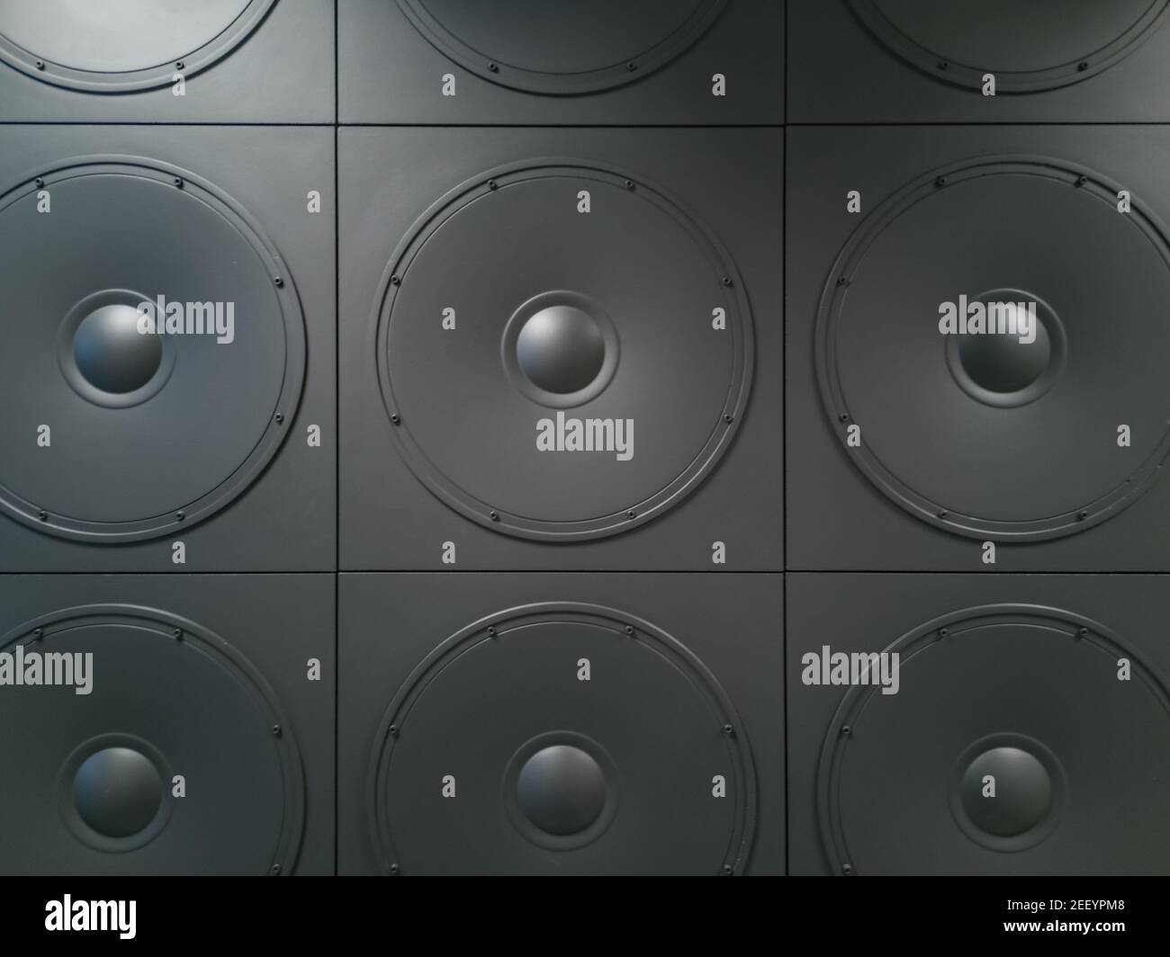 Texture background of wall with square panels with round speakers Stock