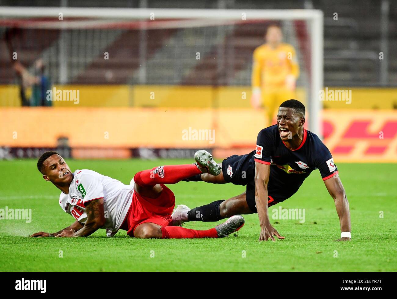 Soccer Football - Bundesliga - FC Cologne v RB Leipzig - RheinEnergieStadion, Cologne, Germany - June 1, 2020 RB Leipzig's Nordi Mukiele in action with FC Cologne's Ismail Jakobs, as play resumes behind closed doors following the outbreak of the coronavirus disease (COVID-19) Ina Fassbender/Pool via REUTERS  DFL regulations prohibit any use of photographs as image sequences and/or quasi-video Stock Photo