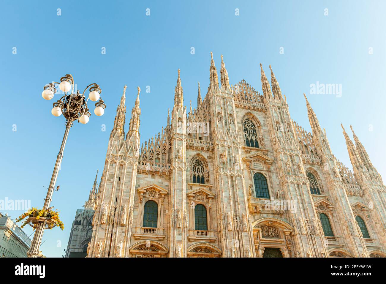 Famous church Milan Cathedral Duomo di Milano with Gothic spires and