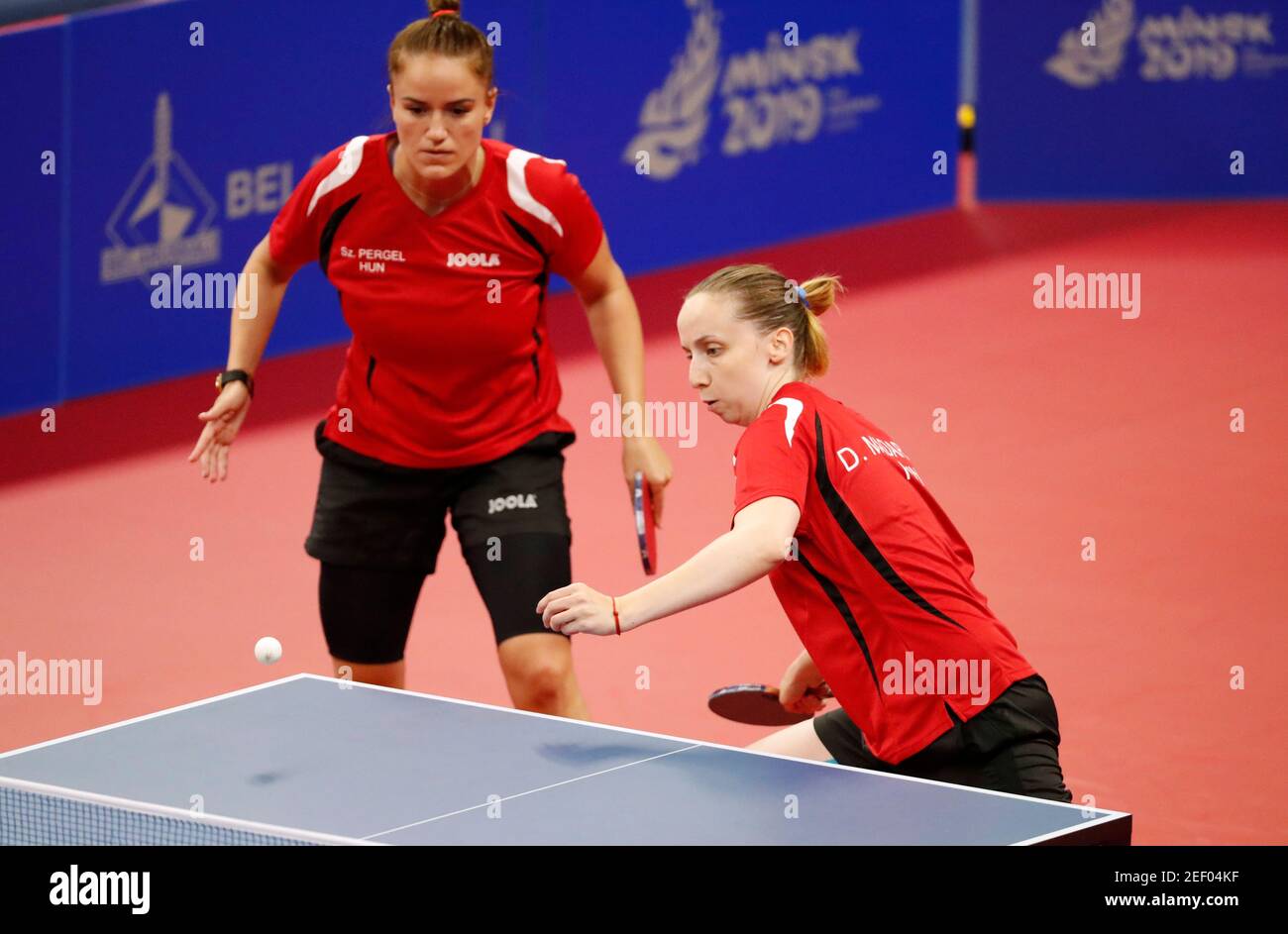 2019 European Games - Table Tennis - Women's Team - Tennis Olympic Centre,  Minsk, Belarus - June 29, 2019. Hungary's Dora Madarasz and Szandra Pergel  in action during match one of the