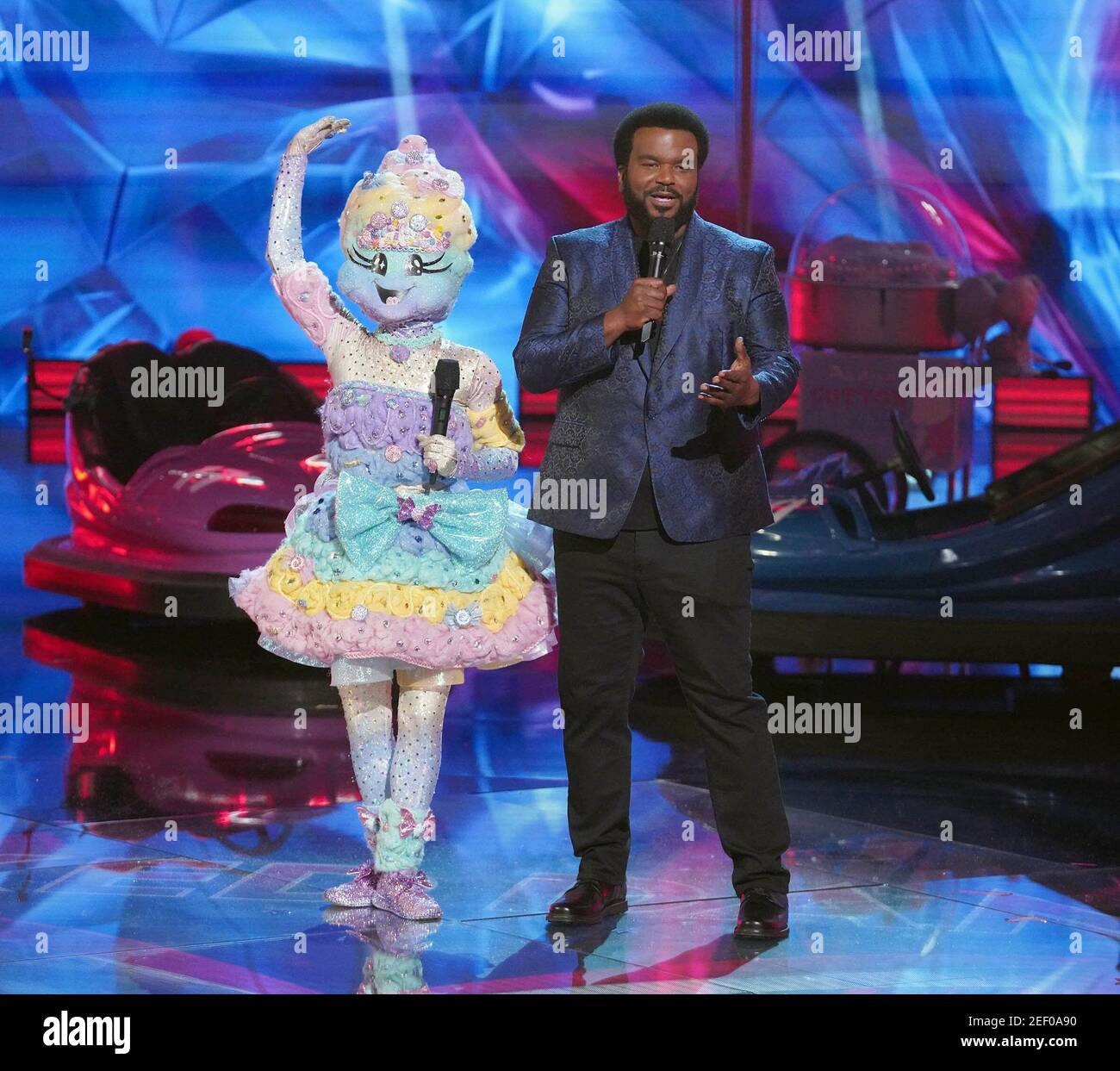 THE MASKED DANCER, from left: Cotton Candy, host Craig Robinson, Super ...