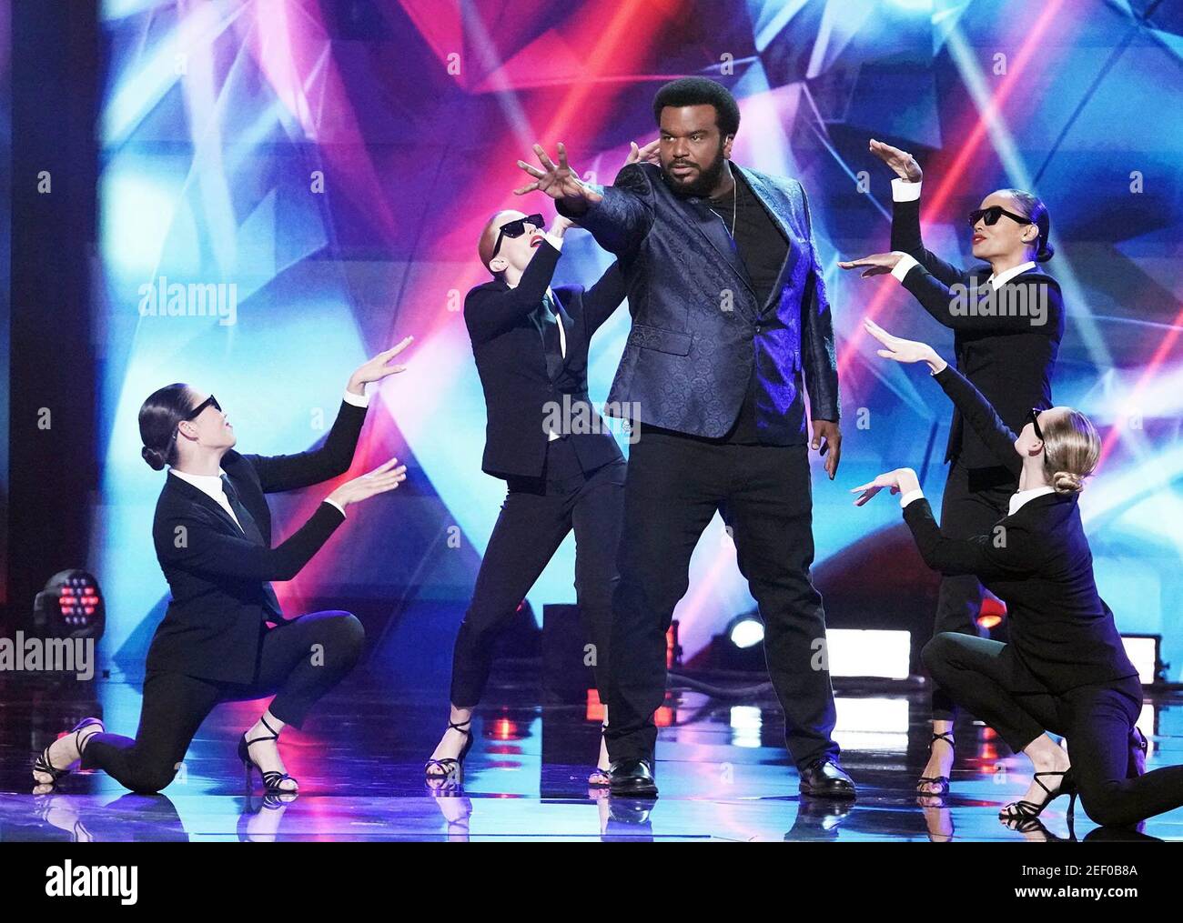 THE MASKED DANCER, host Craig Robinson (center), Super Six', (Season 1 ...