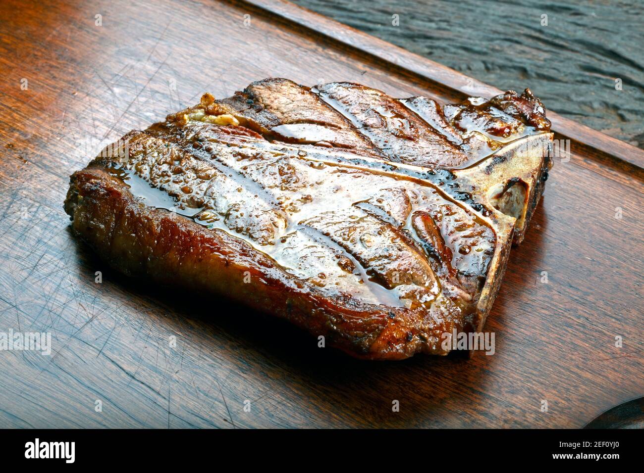 t bone steak with potato salad and vegetables Stock Photo - Alamy