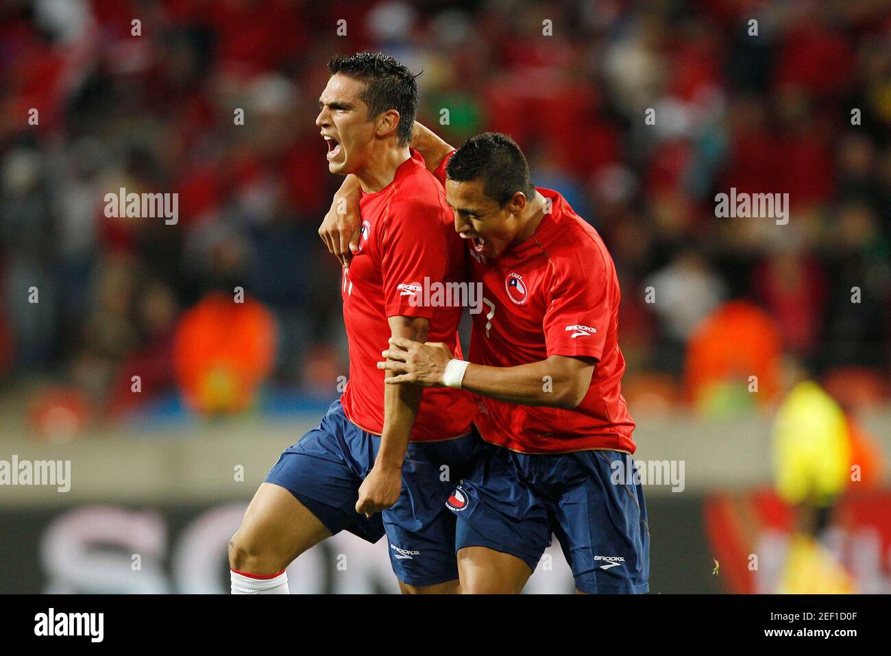 Football - Chile v Switzerland FIFA World Cup South Africa 2010 - Group H -  Nelson Mandela Bay Stadium, Port Elizabeth, South Africa - 21/6/10 Mark  Gonzalez (L) celebrates with Alexis Sanchez