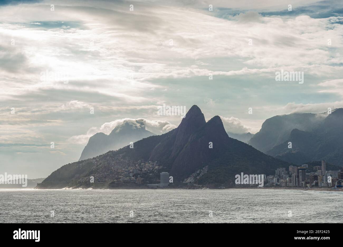 Scenic view of Morro dois Irmaos  (Two Brothers Mountain) and part of Ipanema beach in a cloudy sunset, Rio Stock Photo
