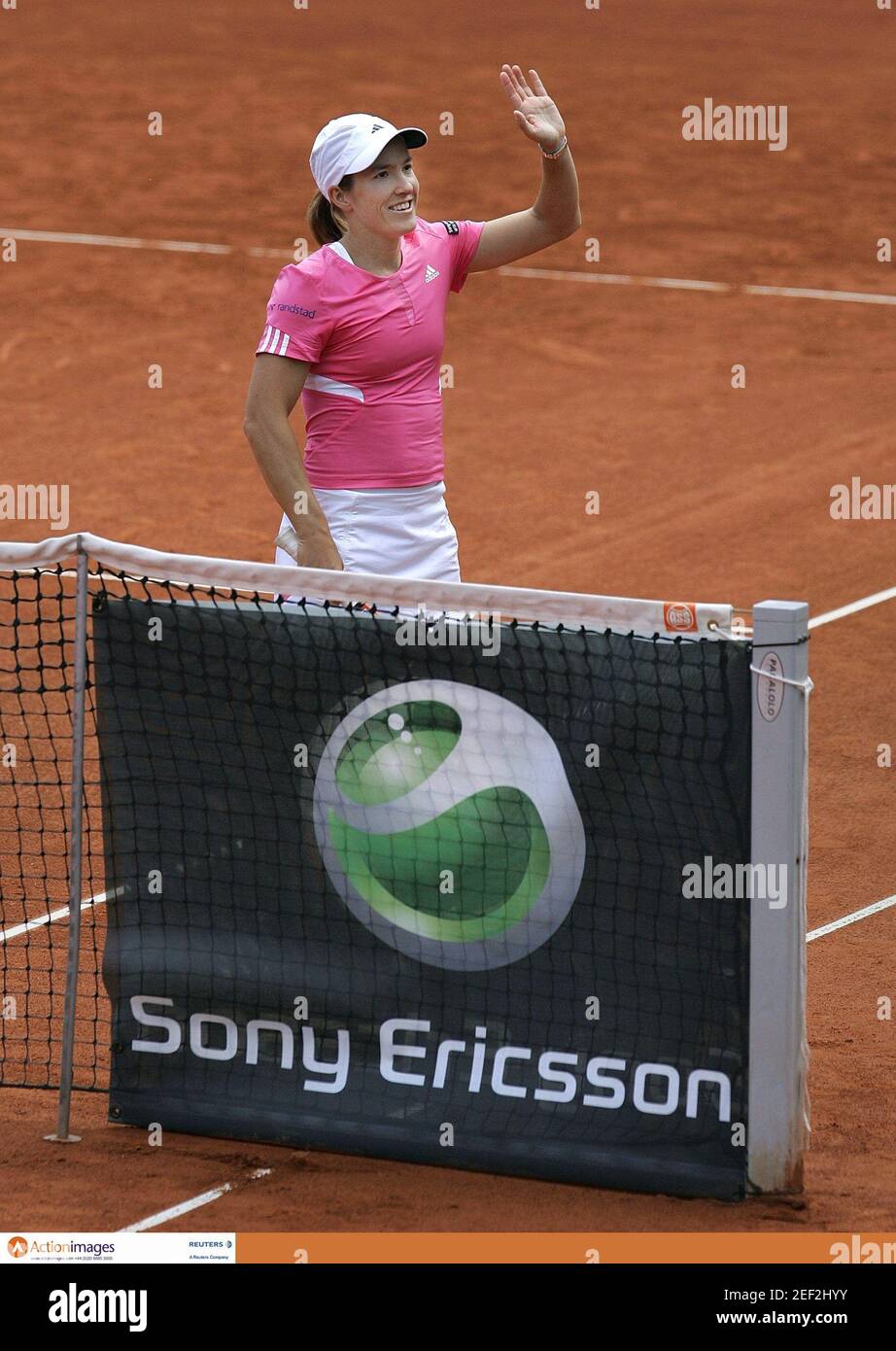 Tennis - Sony Ericsson WTA Tour - Qatar Telecom German Open - Berlin,  Germany - 9/5/07 Justine Henin of Belgium waves to the crowd after  defeating Tatjana Malek of Germany during their