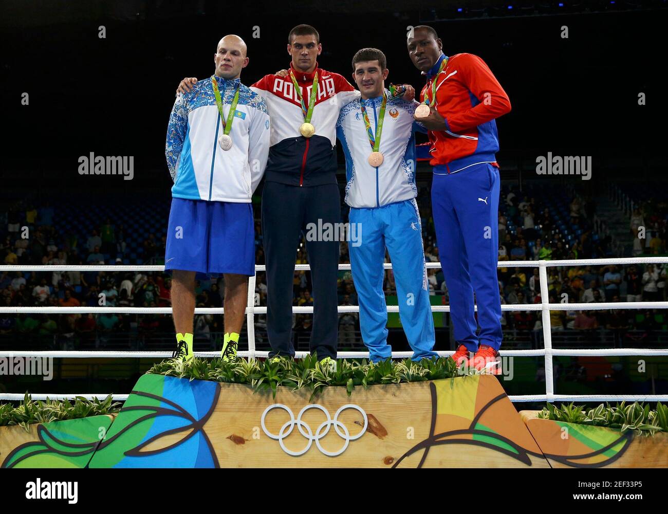 2016 Rio Olympics Boxing - Victory Ceremony - Men's Heavy (91kg) Victory Ceremony - Riocentro - Pavilion 6 - Rio de Janeiro, Brazil - 15/08/2016. (From L) Silver medalist Vassiliy Levit (