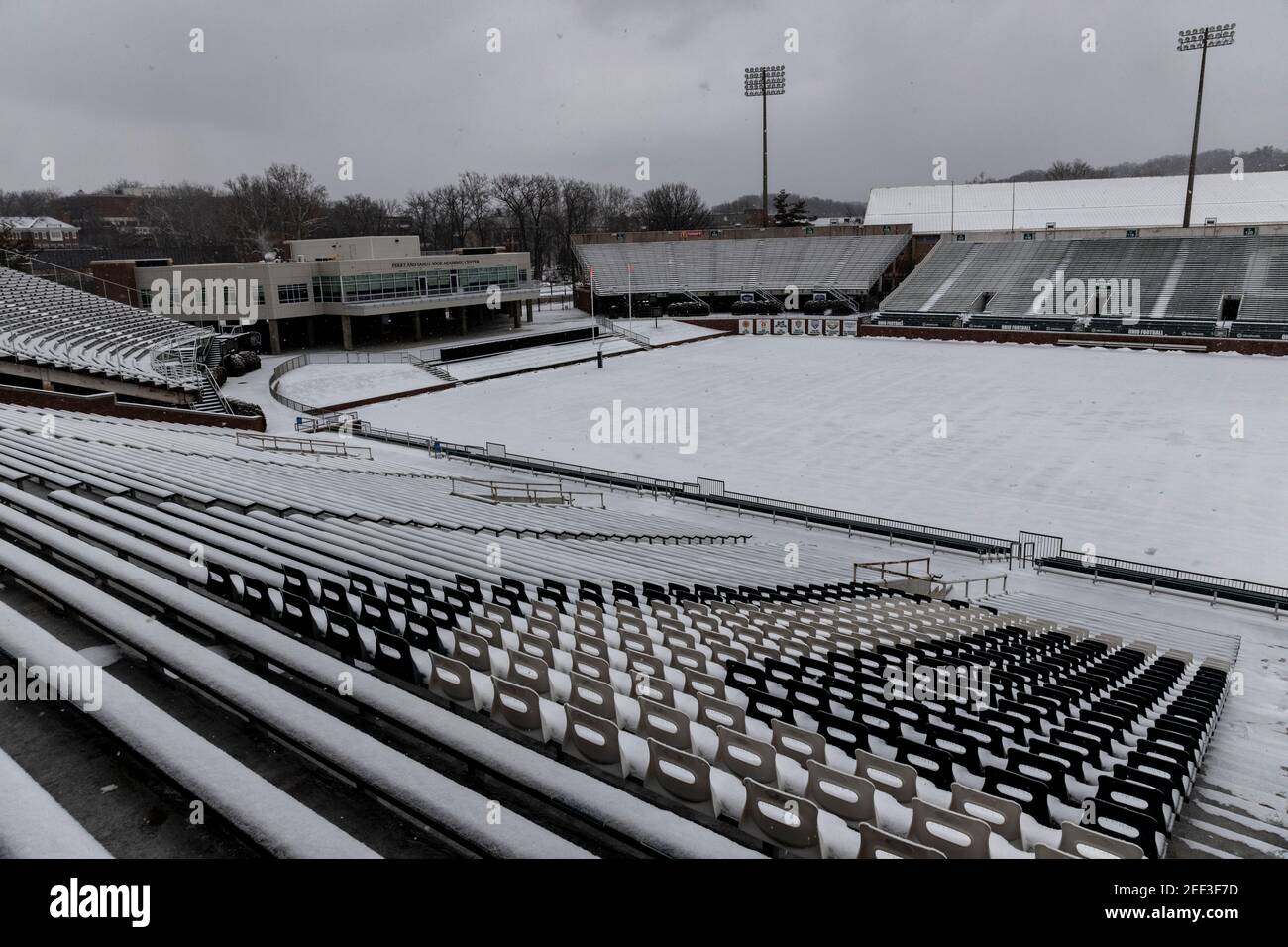 Peden Stadium at Ohio University is covered with snow.Snowstorm Uri swept across the United States from February 12th to the 16th covering the United States in snow and Ice. Uri begun in the Pacific Northwest, and headed all the way to the southeast of US. The storm has claimed many lives due to car accidents and low temperatures. In Athens County Ohio the storm began on Monday morning February 15, 2021 and has continued into Tuesday 16, 2021. Currently Athens County is under a level two snow emergency. Stock Photo